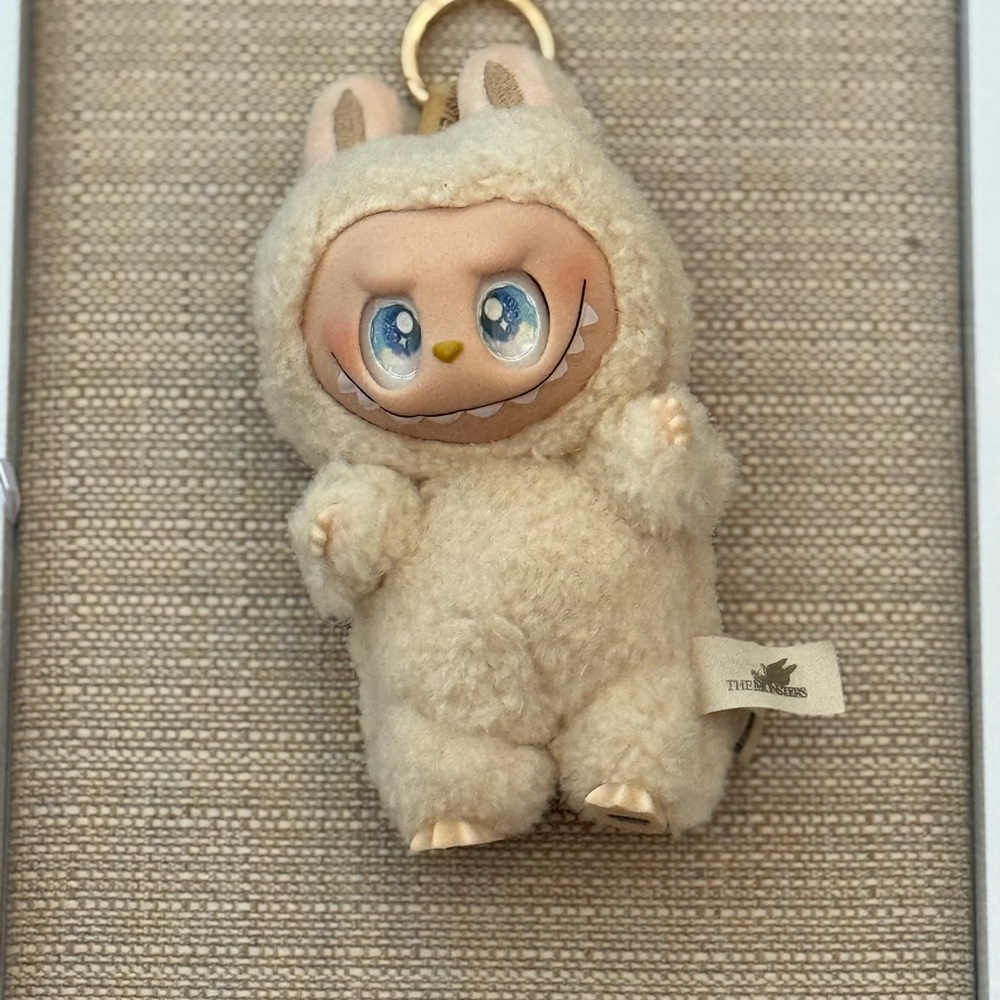 Cream Plush Keychain with Blue Eyes Labubu